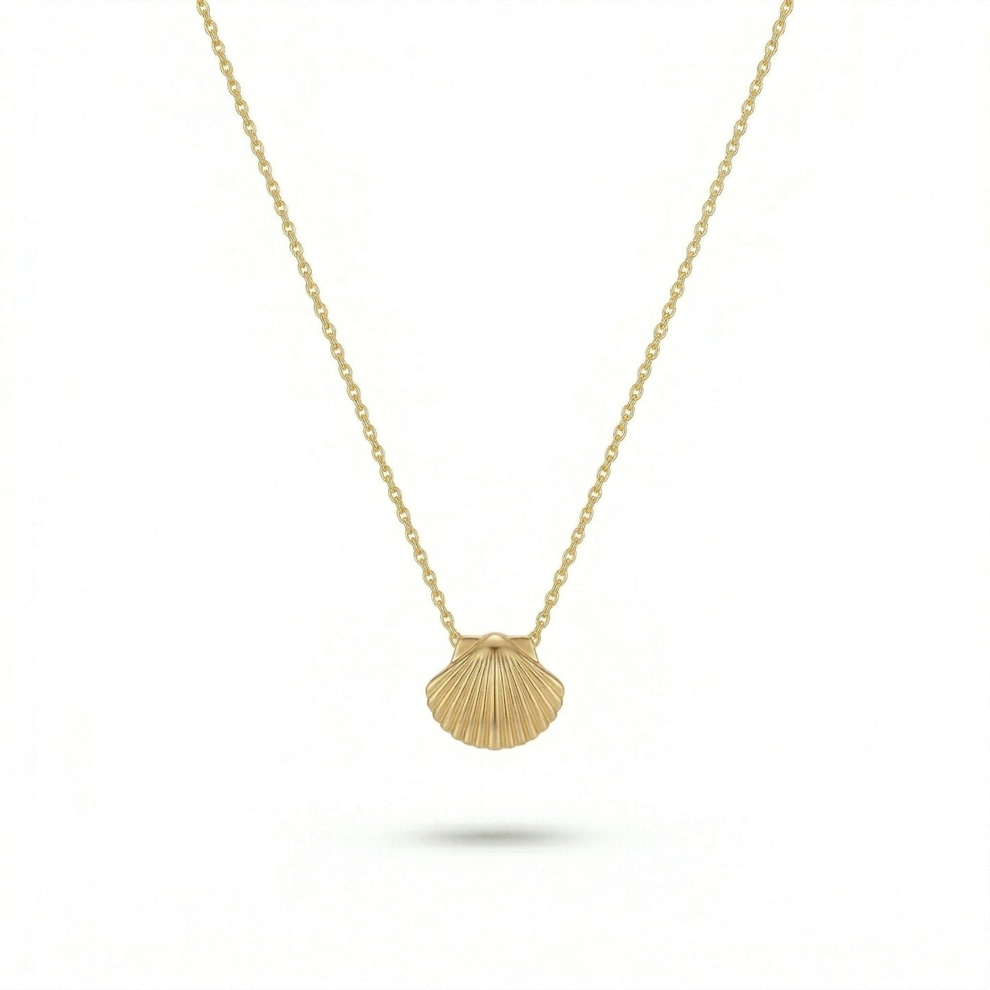 18k gold plated necklace with a shell pendant on a white background