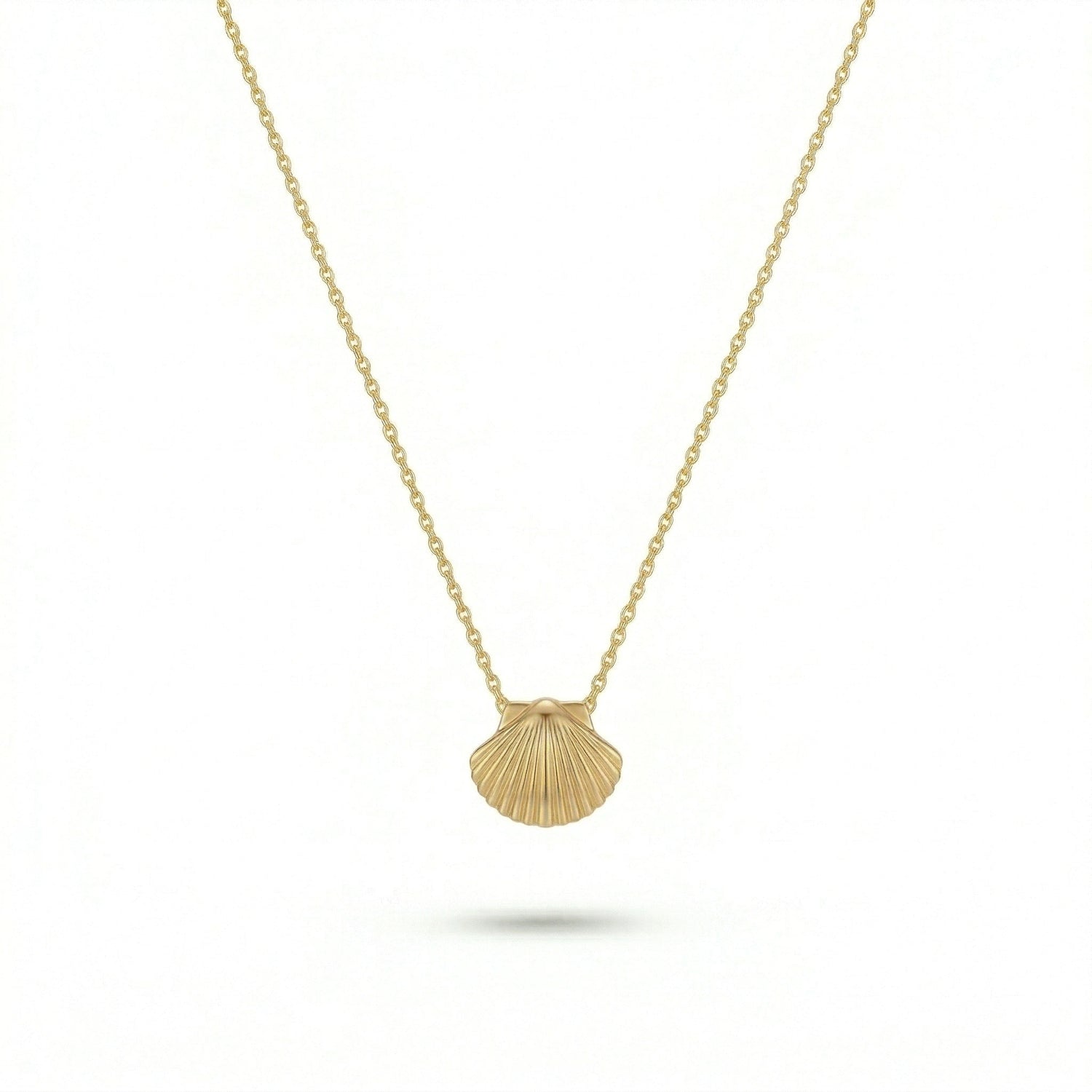 18k Gold plated necklace with a shell pendant on a white background