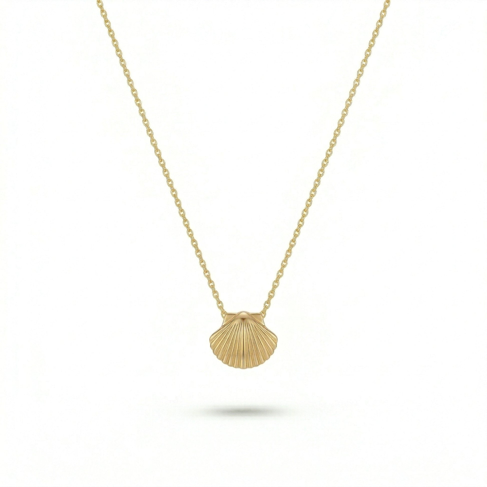 18k Gold plated necklace with a shell pendant on a white background