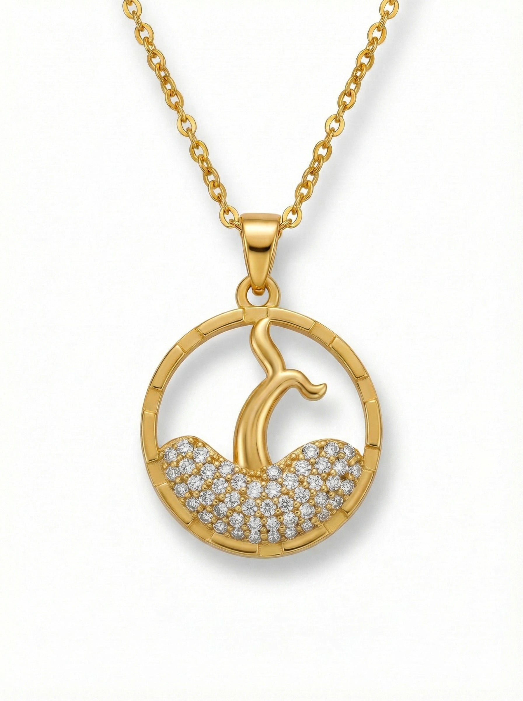 18k Gold plated necklace with a circular pendant featuring a design of a woman and child, set against a white background.