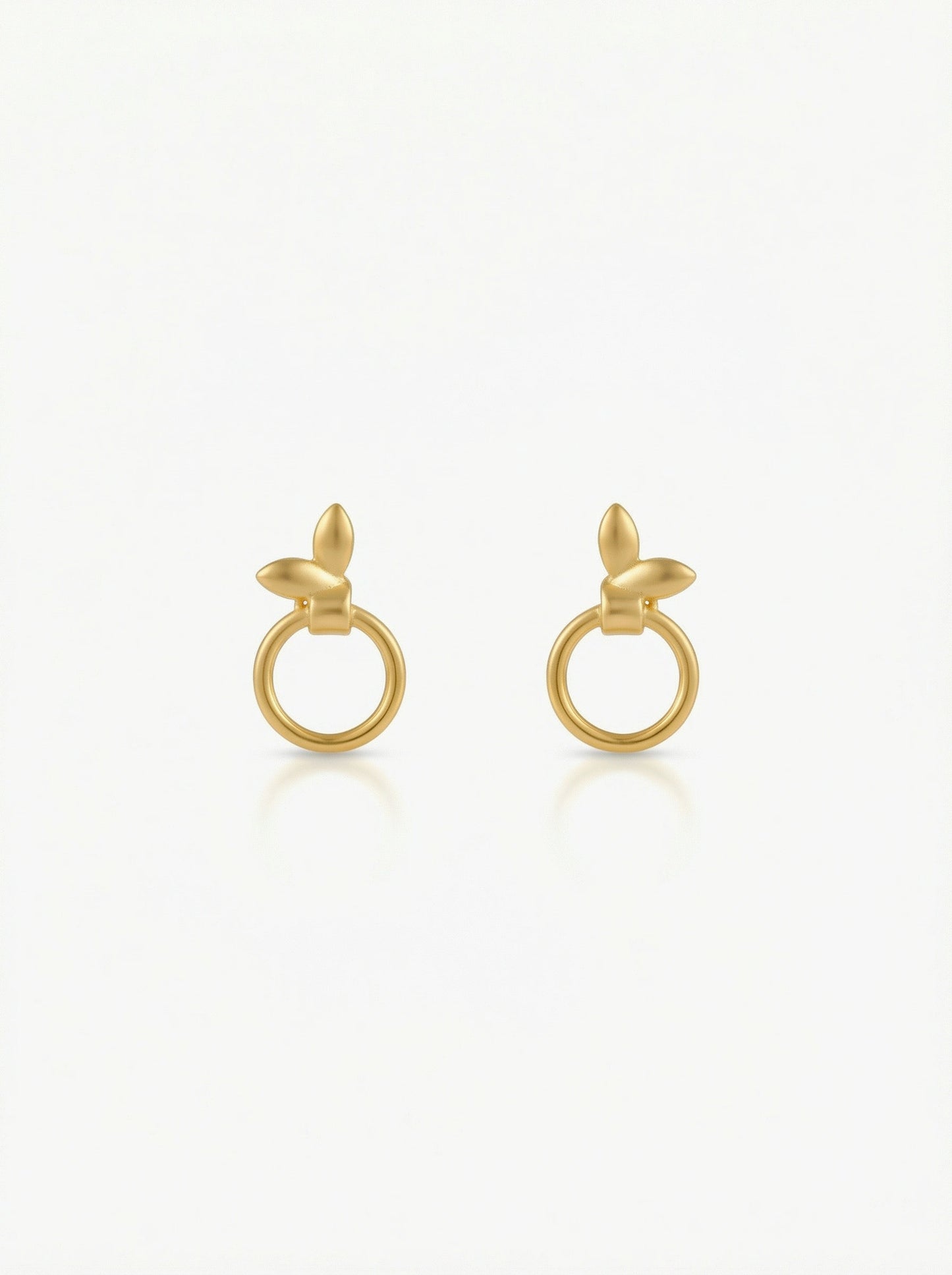 pair of 18k gold plated earrings on a white background