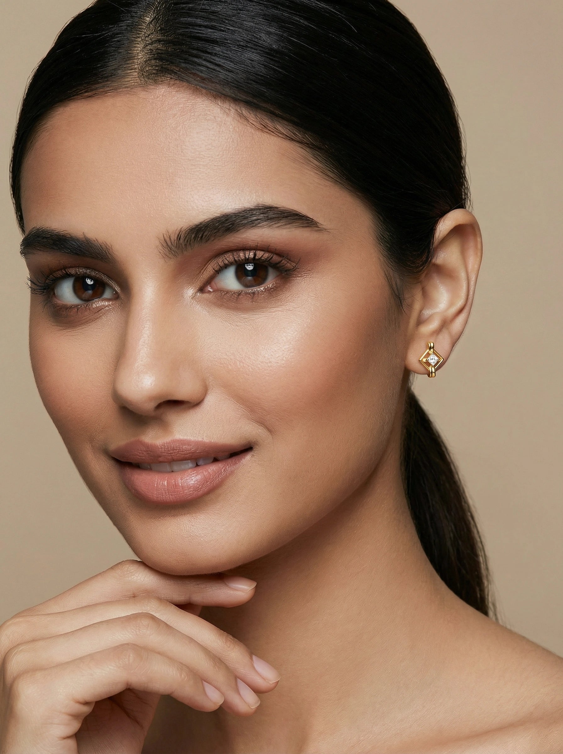 Close-up of a woman with a neutral background