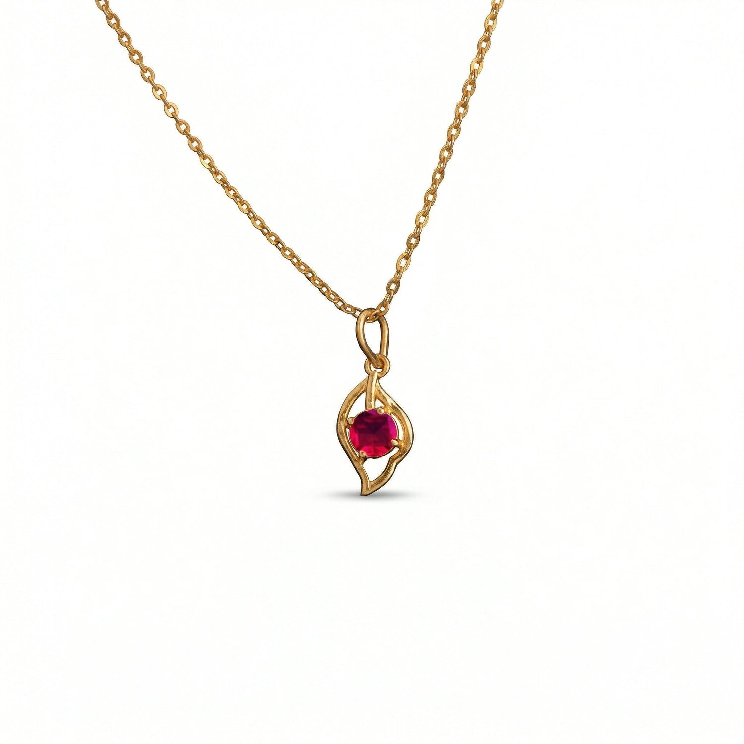 18k Gold plated  necklace with a red gemstone pendant on a white background