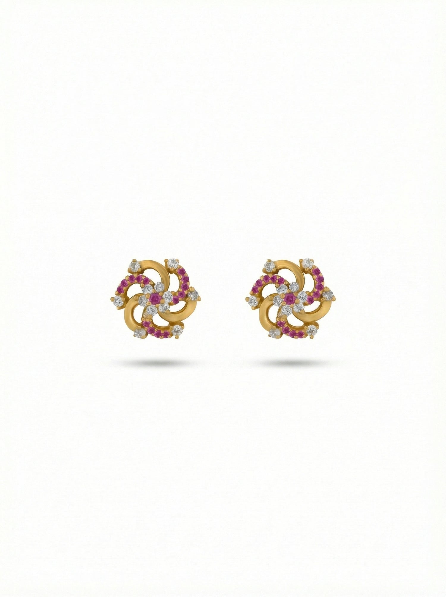 Pair of 18k gold plated earrings with gemstones on a white background