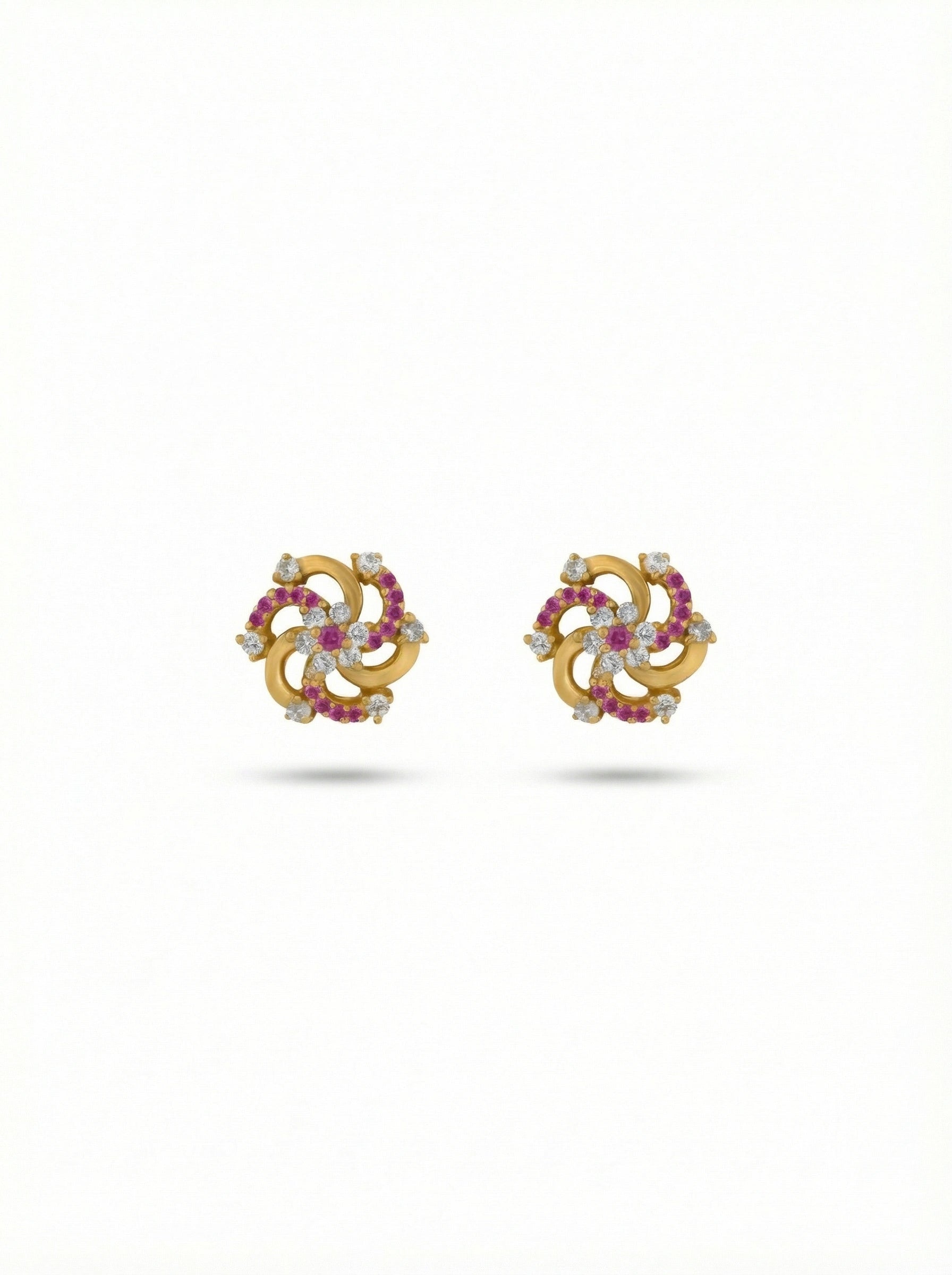 Pair of 18k gold plated earrings with gemstones on a white background