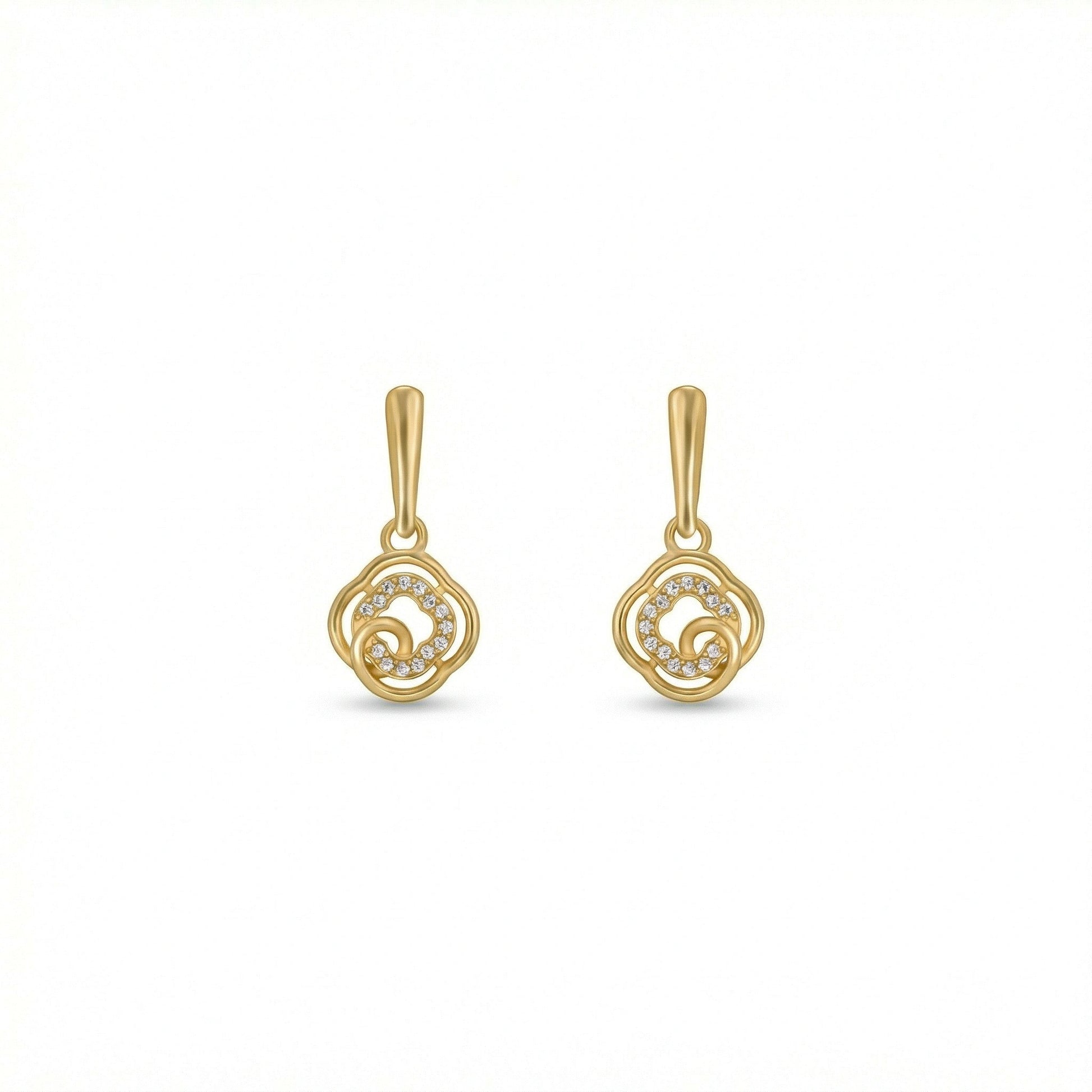Pair of 18k gold plated earrings on a white background