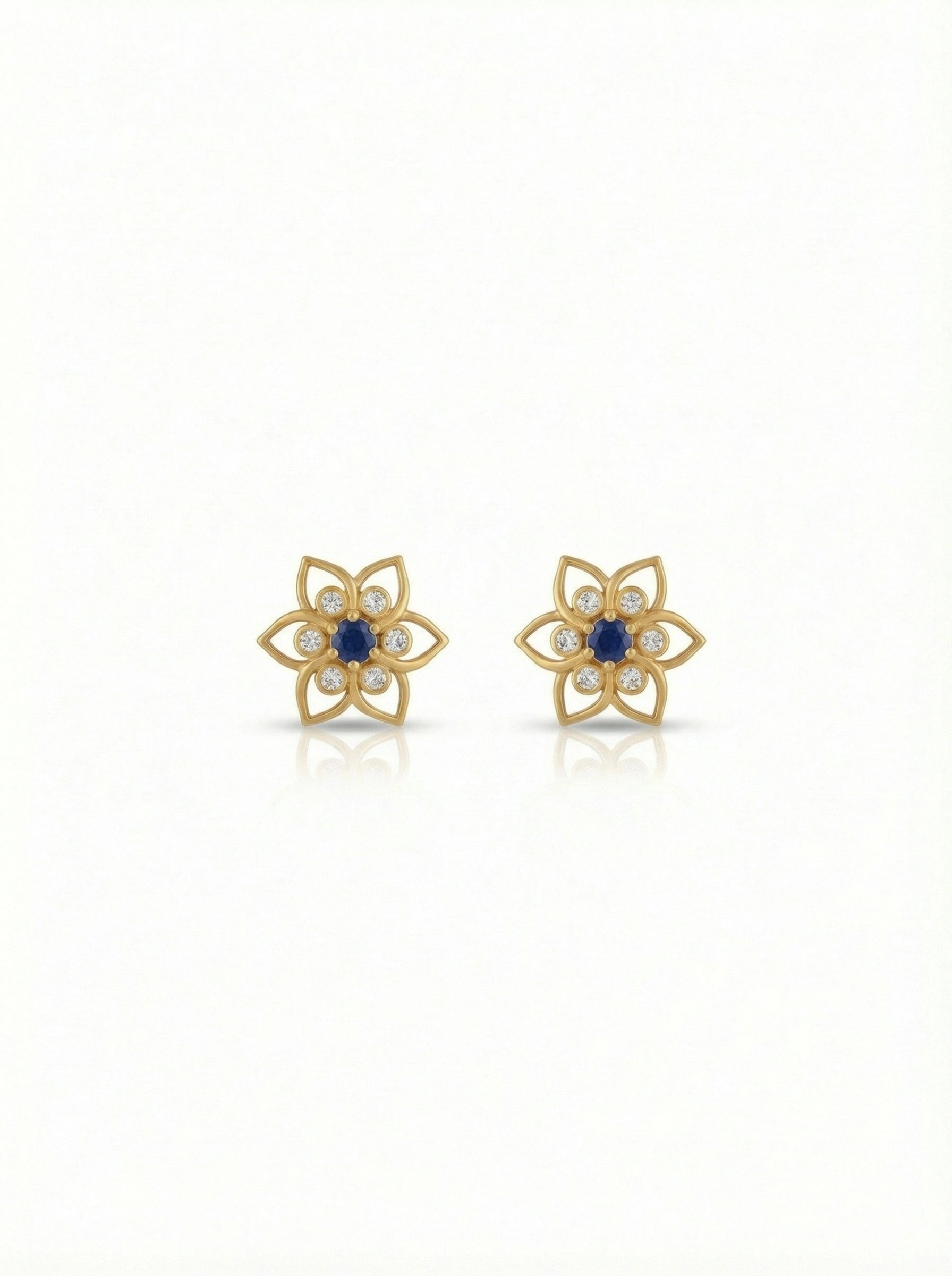 18k Gold plated  flower-shaped earrings with blue centers on a white background