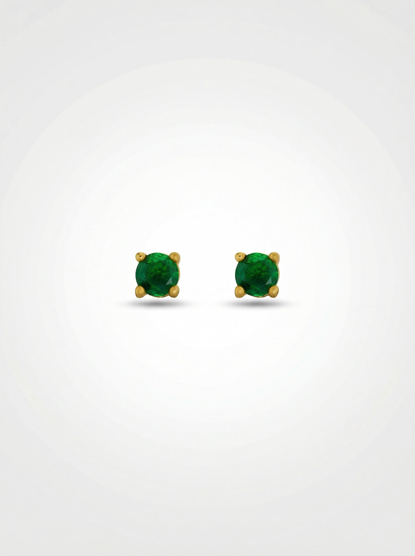 pair of green gemstone earrings with 18k gold plated settings on a white background