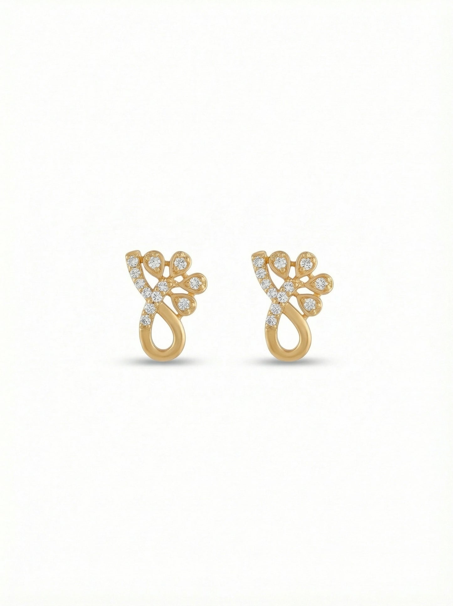 18k gold plated earrings with diamond accents on a white background