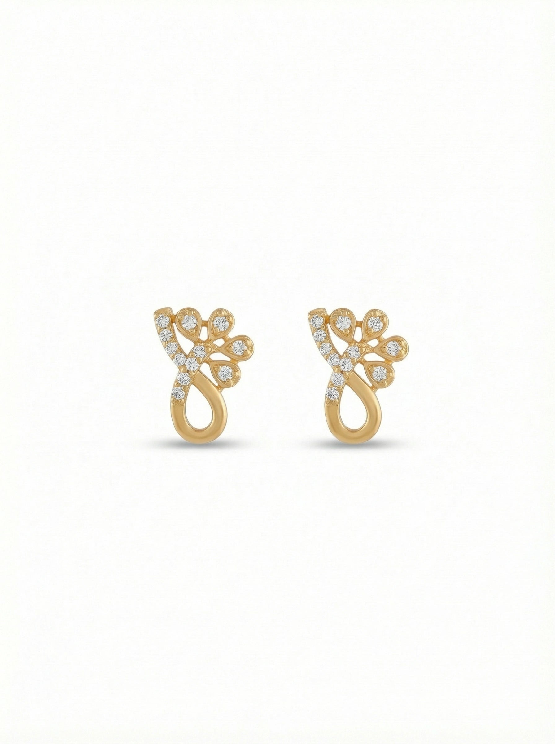 18k Gold plated earrings with diamond accents on a white background