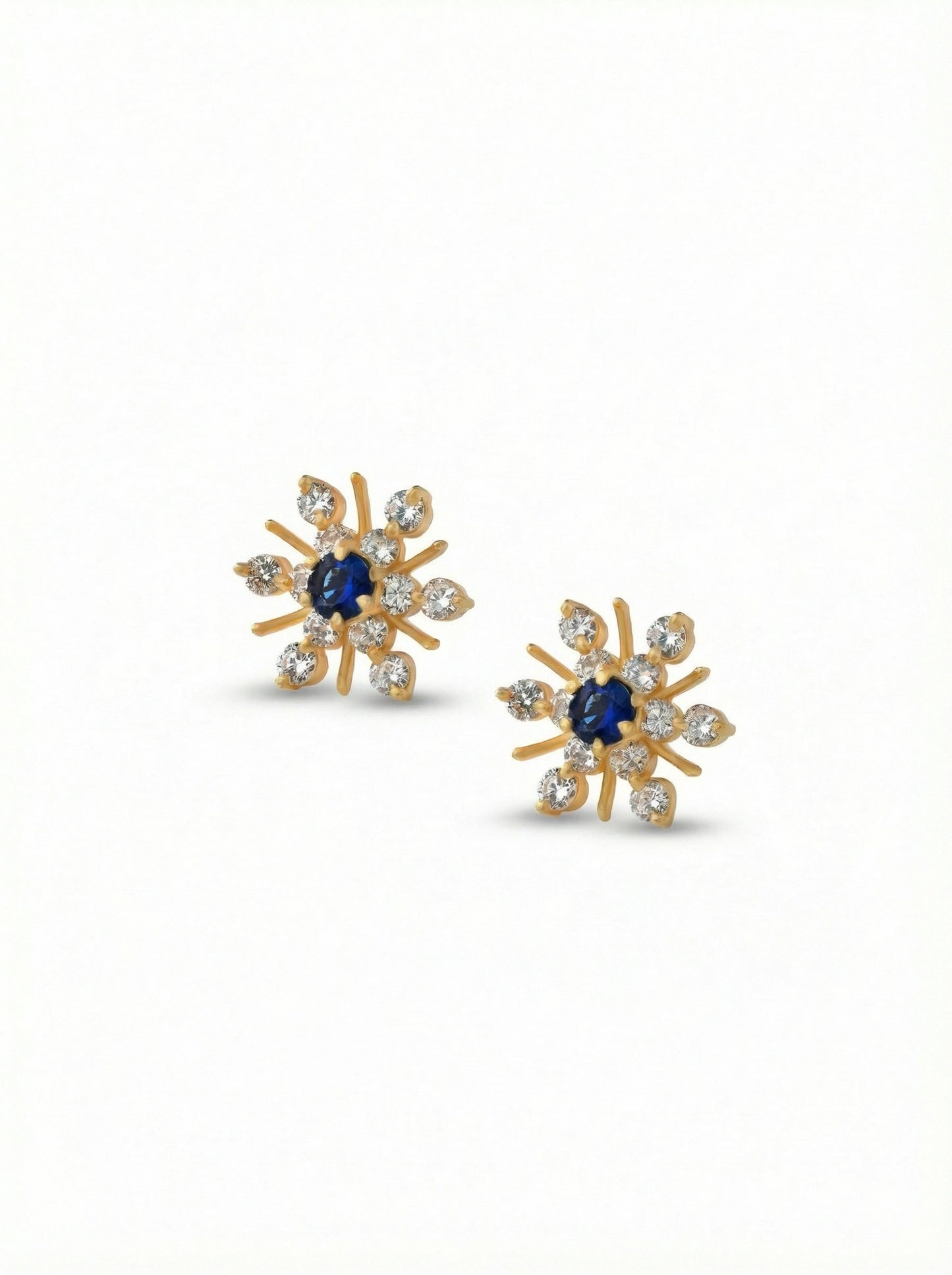 18k gold plated earrings with blue gemstones on a white background