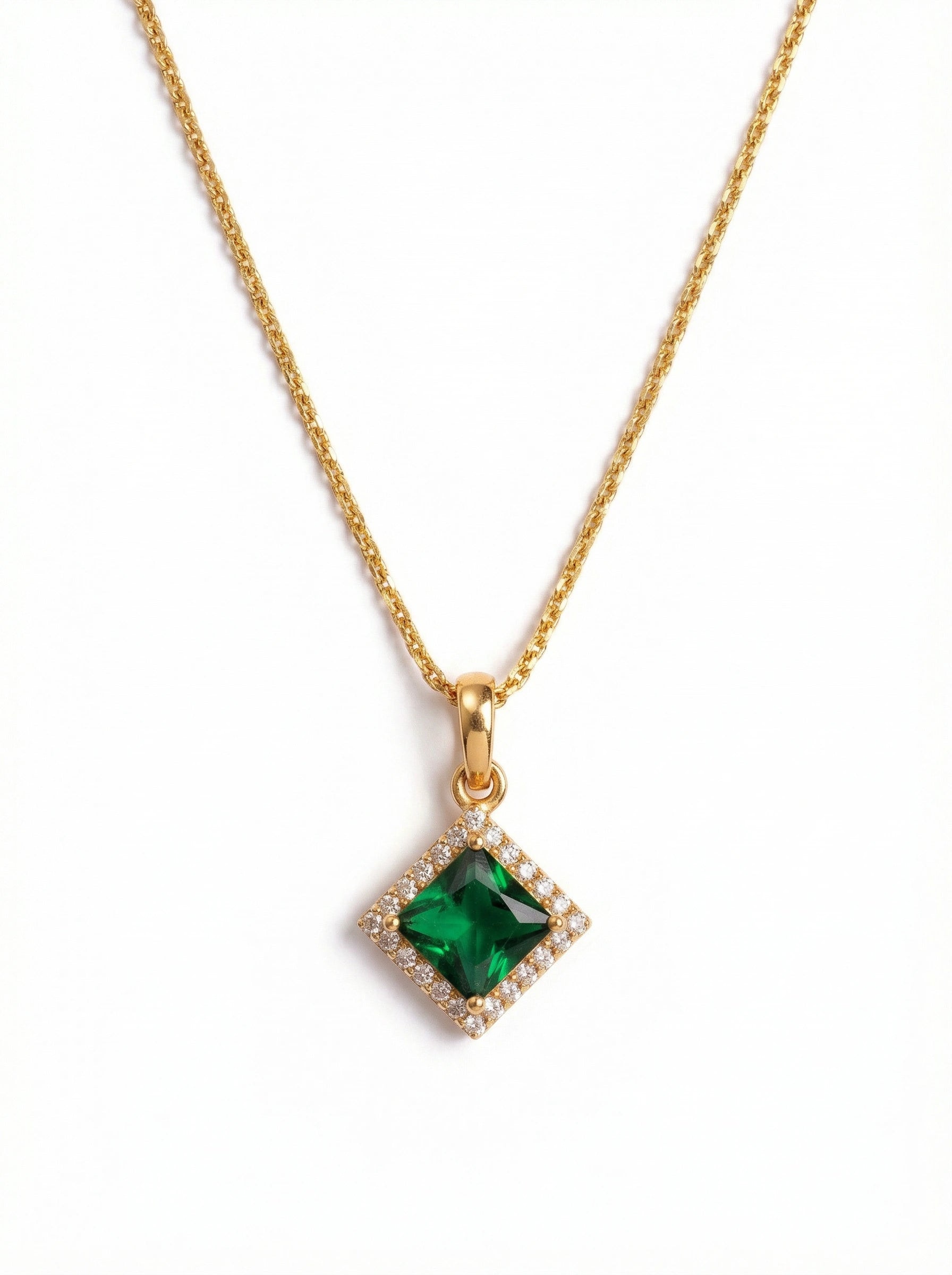 18k Gold plated necklace with a green gemstone pendant on a white background