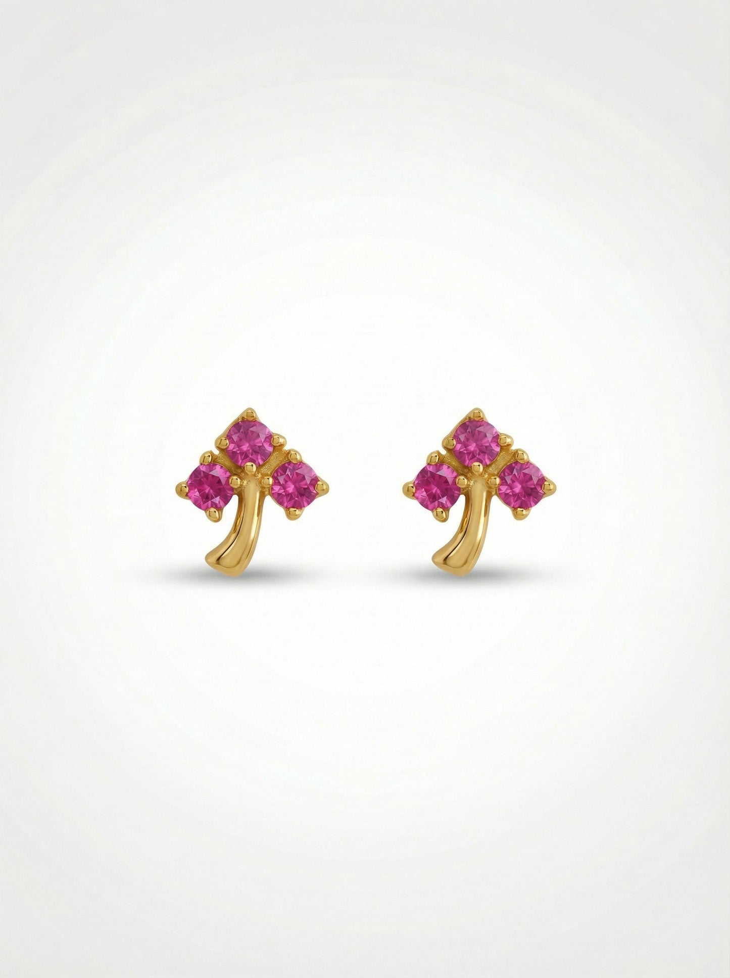 18k gold plated  earrings with pink gemstones on a white background
