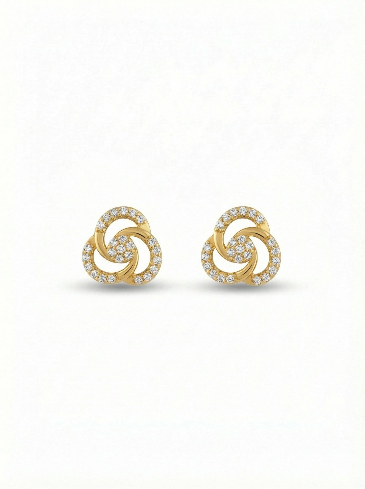 Pair of 18k gold plated earrings with a spiral design on a white background