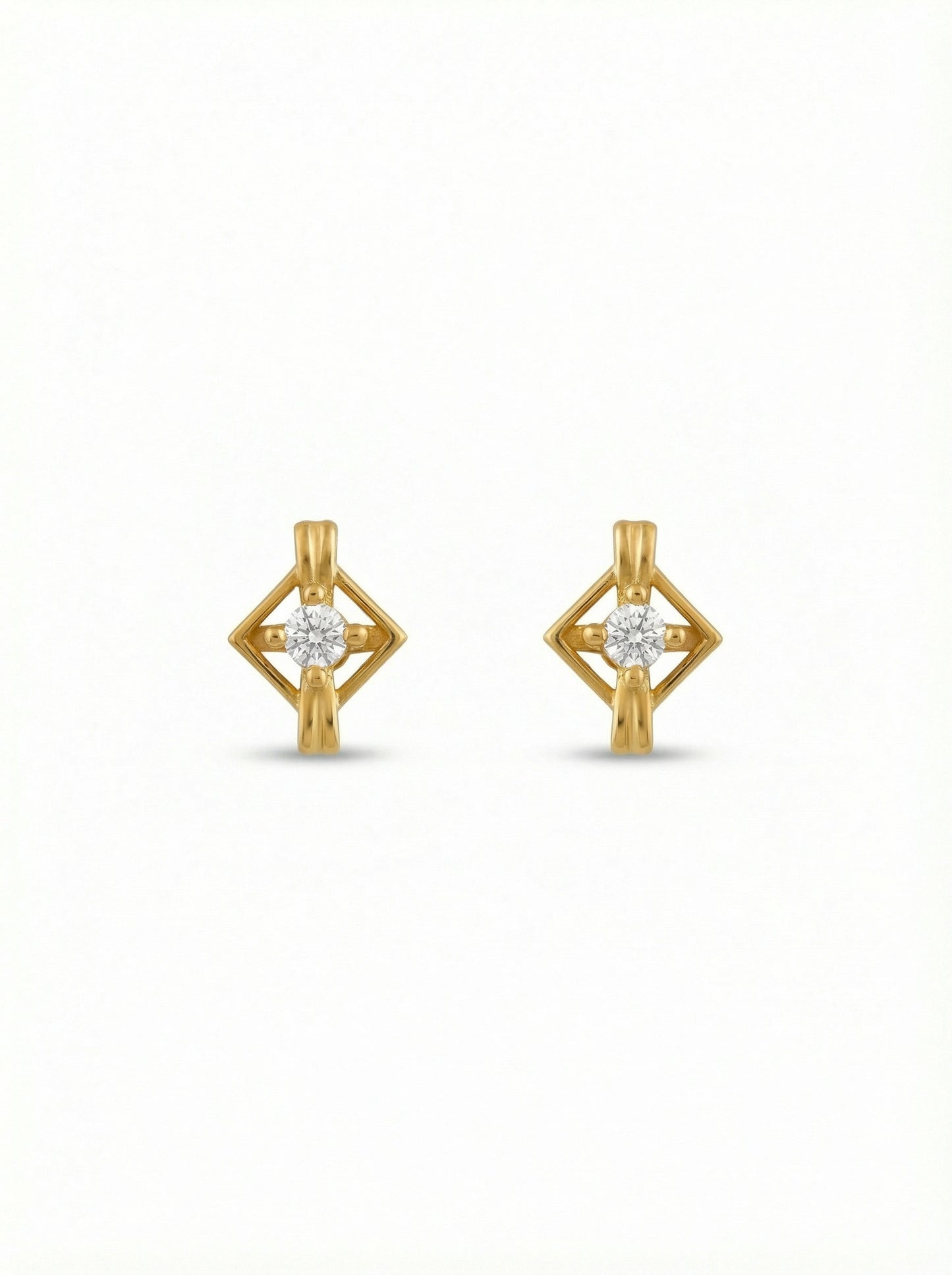 18k gold plated earrings with diamond-like stones on a white background