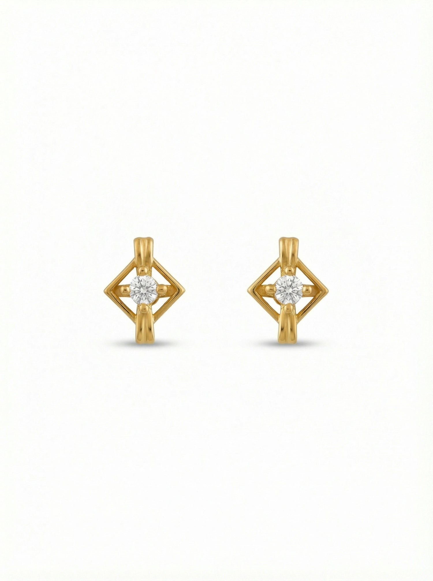18k Gold plated earrings with diamond-like stones on a white background